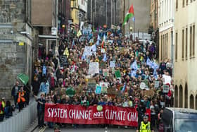 Protesters head down the Royal Mile as part of the climate change protest. 
All photos by Lisa Ferguson.
