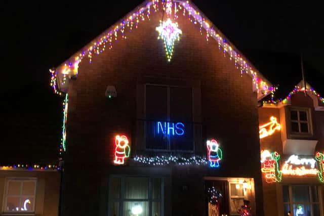 The NHS themed light display has delighted Mario and Susan D'Amico's neighbours