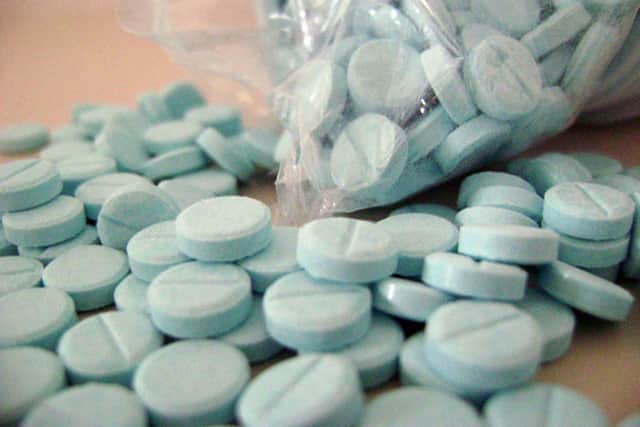 Police say they seized 900,000 diazepam tablets and a pill press when they visited the property in Danderhall on Tuesday.