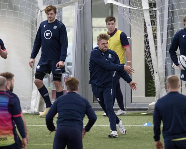 Chris Harris is at the centre of the action during a Scotland training session at the Oriam. Picture: Craig Williamson/SNS