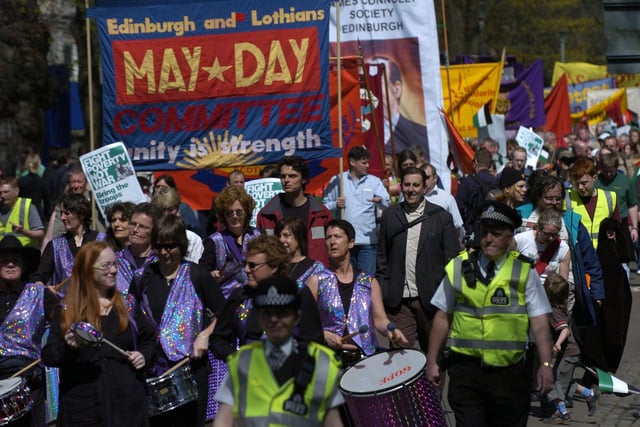 The May Day march and rally in 2006 - the march began in Market Street and ended in the Meadows.  Banners proclaimed: "Unity is Strength" and people taking part held posters saying "Fight Poverty Not War".
