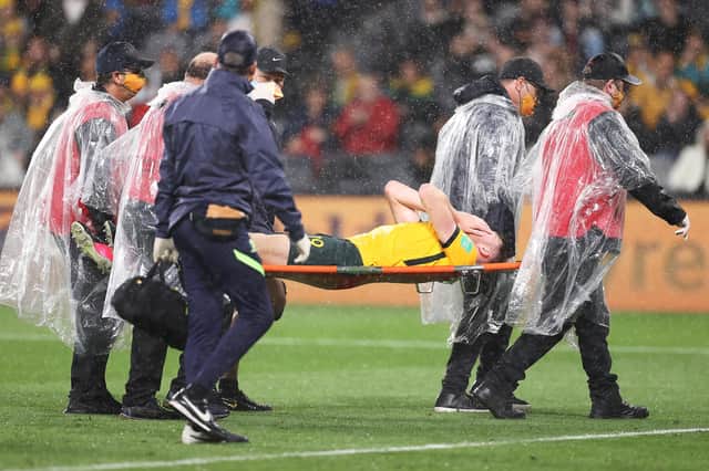 Harry Souttar is stretchered from the field  during Australia's friendly against Saudi Arabia in Sydney. Picture: Mark Kolbe/Getty