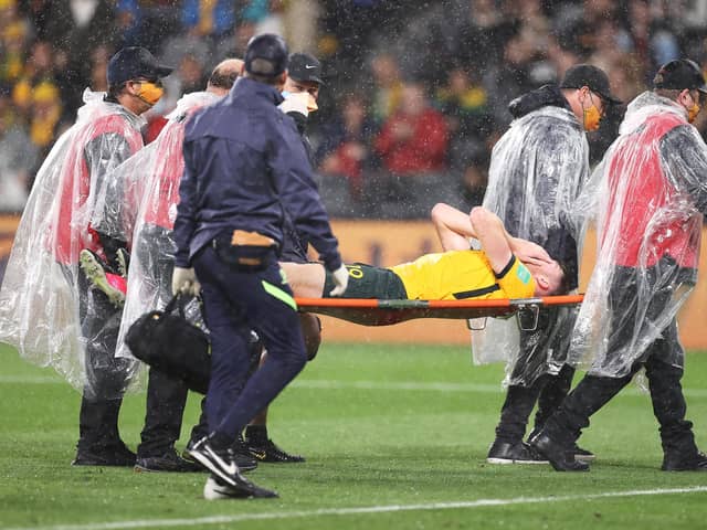 Harry Souttar is stretchered from the field  during Australia's friendly against Saudi Arabia in Sydney. Picture: Mark Kolbe/Getty