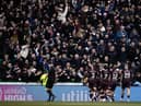 Hearts fans rejoice after Toby Sibbick scored in the 3-0 win over Hibs at Easter Road in January. Picture: SNS