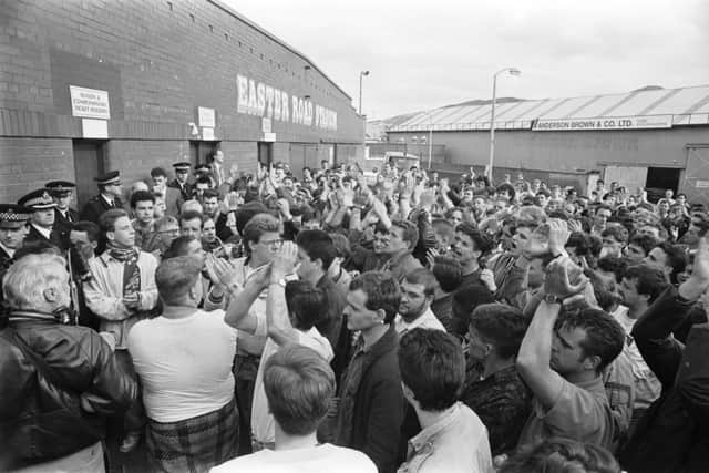 Hundreds of angry Hibs fans turned up at Easter Road after hearing Mercer planned a takeover of their club. This led to the Hands off Hibs campaign.