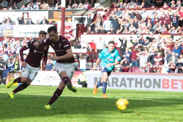 Jamie Walker scores a penalty to put Hearts 2-1 ahead against Hamilton
