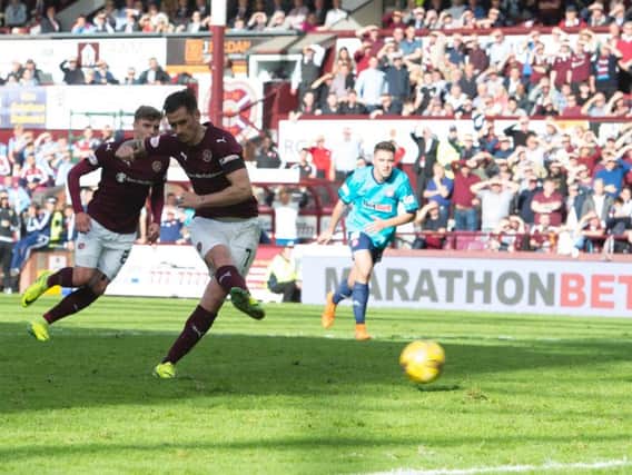 Jamie Walker scores a penalty to put Hearts 2-1 ahead against Hamilton