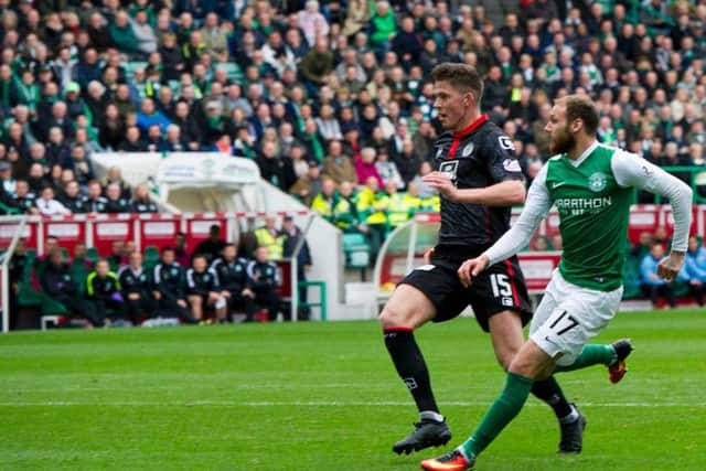 Martin Boyle fires Hibs into an eighth minute lead against St Mirren with a superb clip over goalkeeper Jamie Langfield