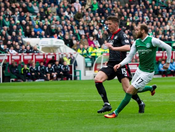 Martin Boyle fires Hibs into an eighth minute lead against St Mirren with a superb clip over goalkeeper Jamie Langfield