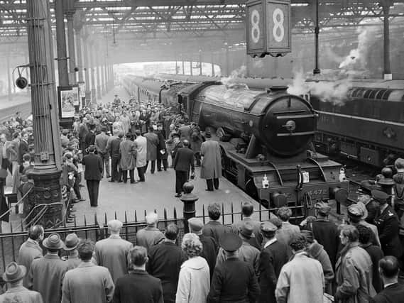 Crowds gather to watch the Flying Scotsman leave Waverley Station in 1964 (Photo: TSPL)