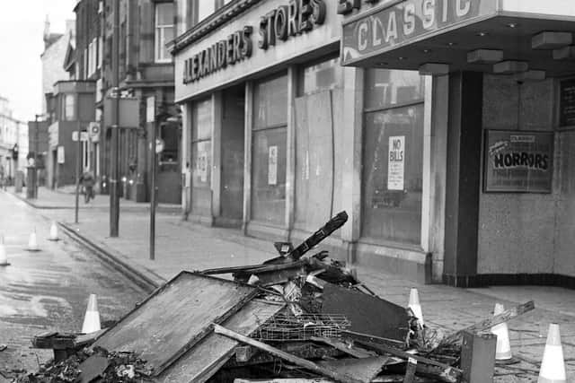 Charred and water-damaged fittings from the Classic Cinema lie in Nicolson Street after a fire in April 1979