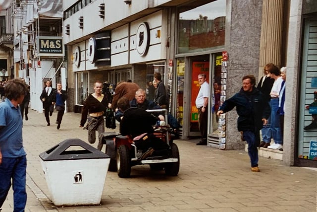 Curious Princes Street shoppers looked on in 1995 as filming commenced on one of the most iconic scenes in British movie history - the opening scene of Trainspotting.
