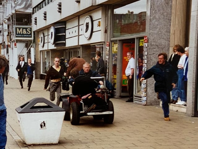 Curious Princes Street shoppers looked on in 1995 as filming commenced on one of the most iconic scenes in British movie history - the opening scene of Trainspotting.