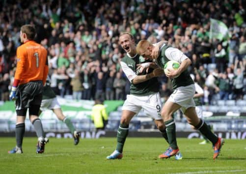 Leigh Griffiths shows his delight after Eoin Doyle had made it 3-3 at Hampden before Sparky himself  scored that dramatic winner in extra time. Picture: Greg Macvean