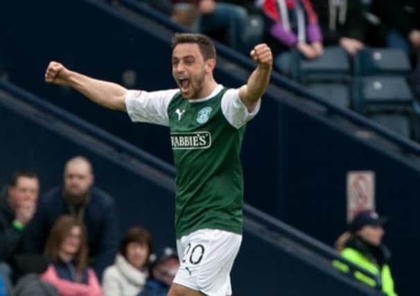 Hibernian's Tom Taiwo celebrates victory in the Cup semi. Picture: PA