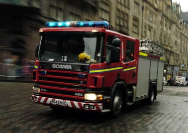 A man and two children were rescued from a house fire in West Lothian. Picture: TSPL