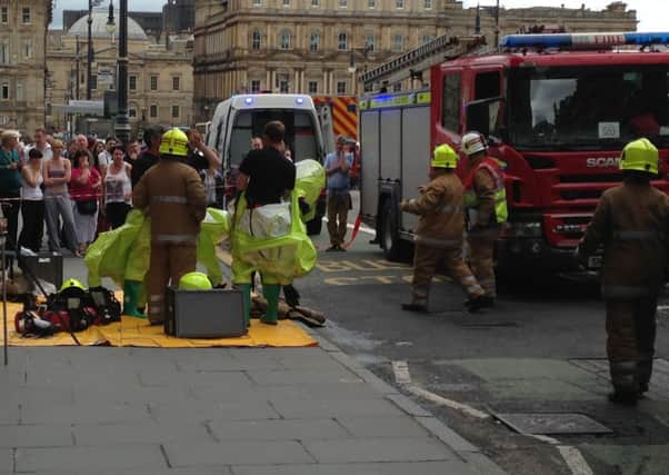 Firefighters outside the Scotsman Hotel today. Picture: Joey Kelly
