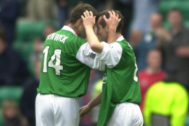 Grant Brebner, right, celebrates his goal with Paul Fenwick