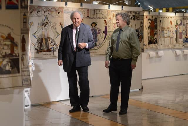 Alexander McCall Smith and Andrew Crummy with the tapestry. Picture: Neil Hanna