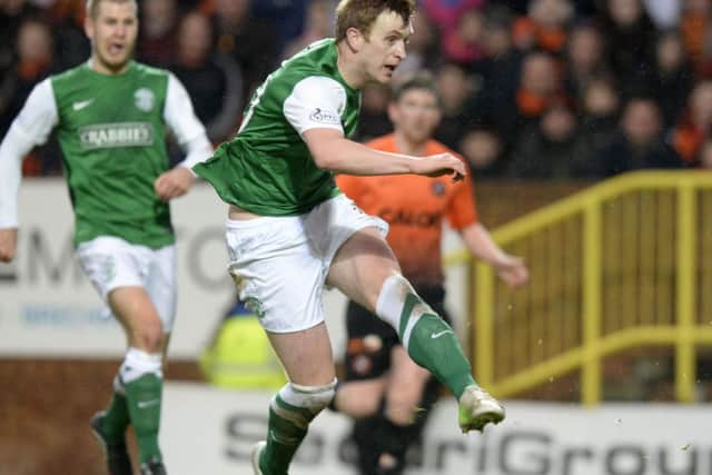Liam Craig opens the scoring for Hibs at Tannadice. Picture: SNS