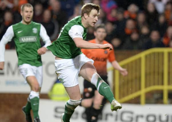 Liam Craig opens the scoring for Hibs at Tannadice. Picture: SNS
