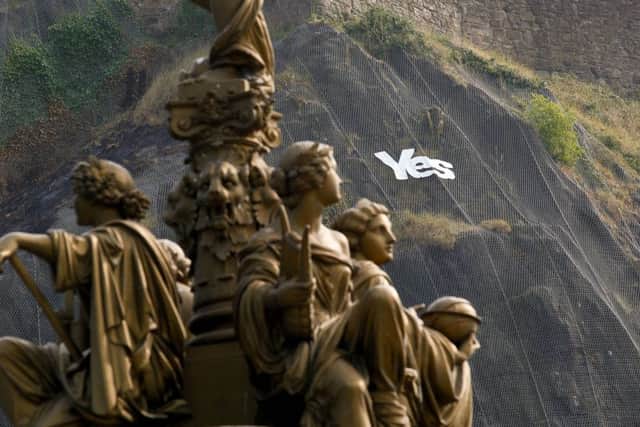 A "YES" campaign banner on Edinburgh Castle rock. Pic: Scott Louden