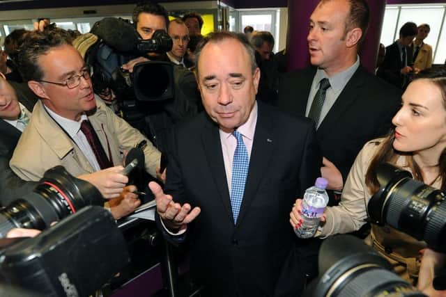 Alex Salmond talks to the press at Edinburgh Airport: Pic: Lisa Ferguson