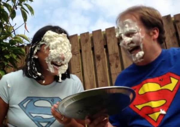 Whipped cream drips off the faces of Lucy Khan and Chris Cartlidge. Picture: contributed