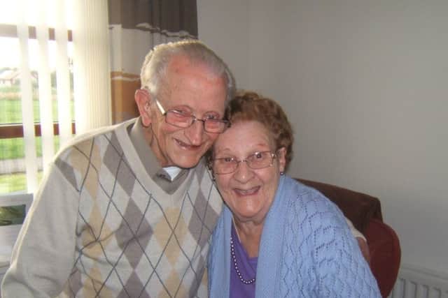 Andrew Russell protected his wife, Dot, from the American bulldog. Picture: contributed