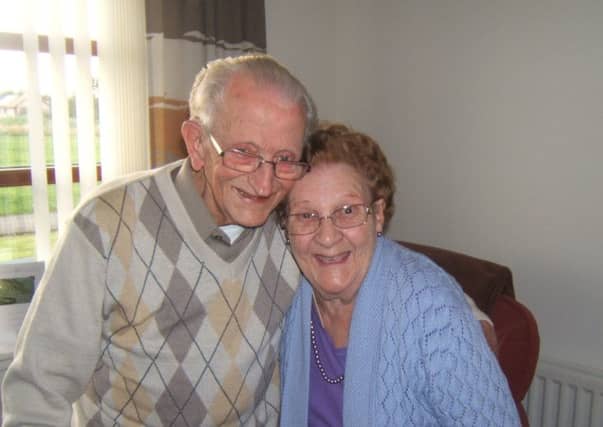 Andrew Russell protected his wife, Dot, from the American bulldog. Picture: contributed