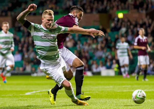 Alim Ozturk concedes a penalty with this foul on Celtic's John Guidetti