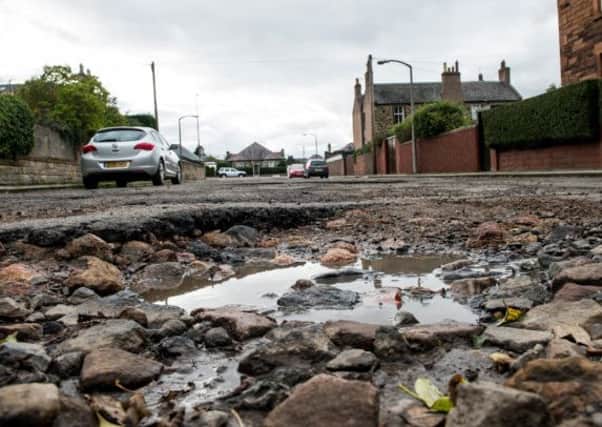 The bill for repairing cracked and ptholed roads across the city would run to £260m, according to a leaked council report. Picture: Ian Georgeson