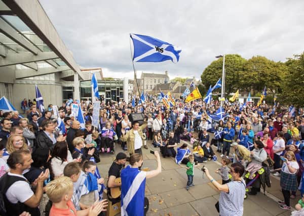 The protesters outside the Scottish Parliament. Picture: Malcolm McCurrach