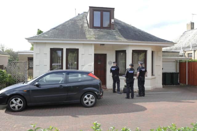 Police at the scene in Crewe Road South. Picture: Greg Macvean