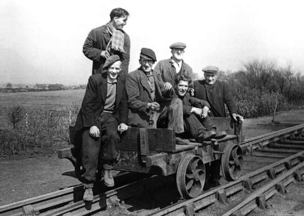 A group of railwaymen on their trolley. Picture: comp