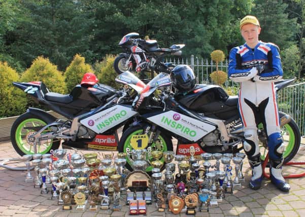 Jordan Gill with his huge collection of trophies. Picture: contributed