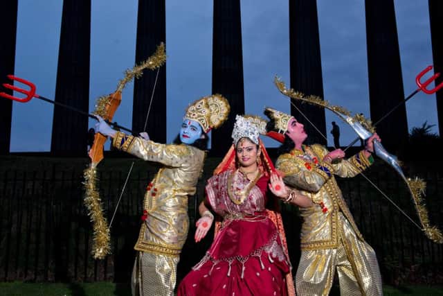 Lady Sita played by Saloni Sonawala is protected by Rama (Blue) played by Nirav Mehta and his brother Laxman (Red) played by Puneet Dwivedi. Picture: Alex Hewitt