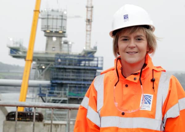 Deputy First Minister Nicola Sturgeon tours the north side development of the Forth Replacement Crossing. Picture: HeMedia