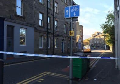 Police taped off Eyre Place. Picture: Alan Young