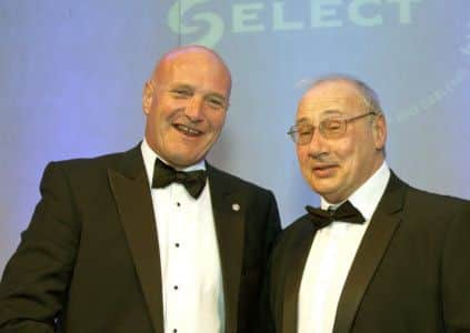 Sponsor Colin Farfar, left, gives Dennis Coppola his award. Picture: comp