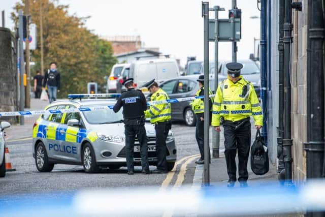 Police at the scene of the alleged attack on Eyre Place. Pic: Ian Georgeson