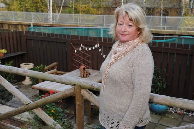 Bernadette Willison by the railway works. Picture: Neil Hanna