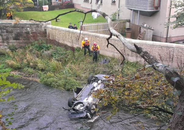 The car in the Water of Leith. Picture: Lizzy Buchan
