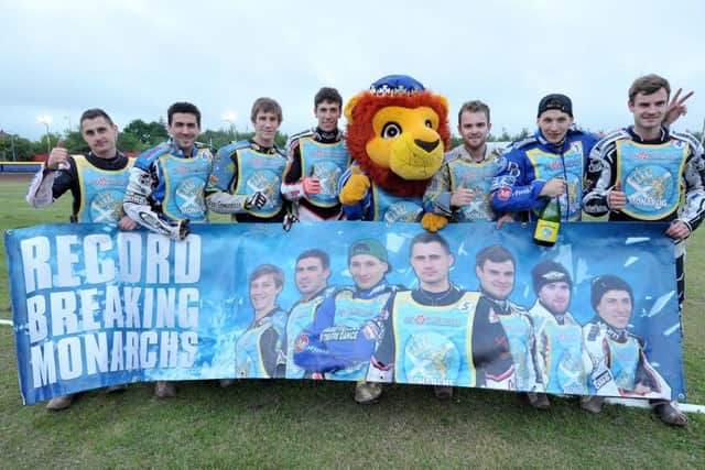 The words on the banner say it all for the high-achieving Monarchs. Picture: Ron MacNeill