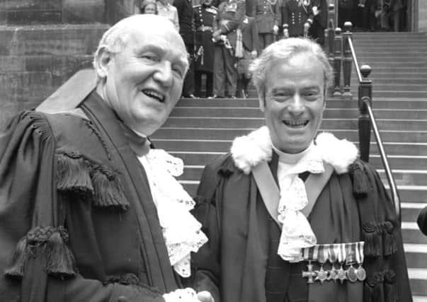 Robin Barbour takes over from retiring moderator Dr Peter Brodie, left, at the General Assembly in 1979