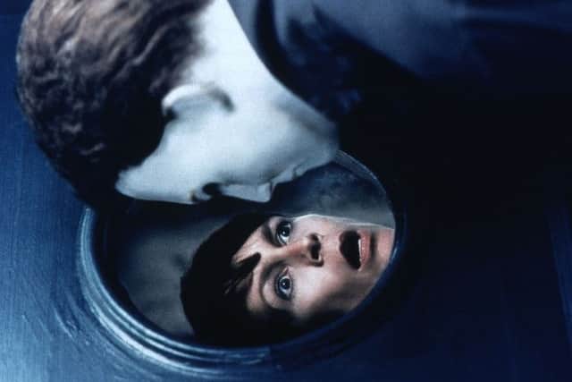 Jamie Lee Curtis in "Halloween H2O" with masked bogeyman "Michael Myers." Pic: Comp