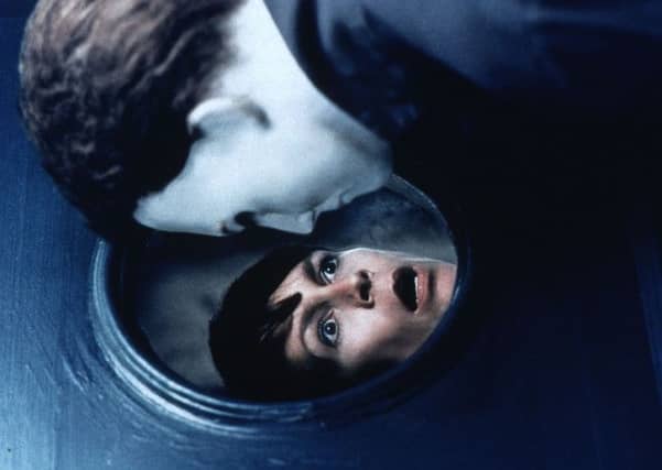 Jamie Lee Curtis in "Halloween H2O" with masked bogeyman "Michael Myers." Pic: Comp
