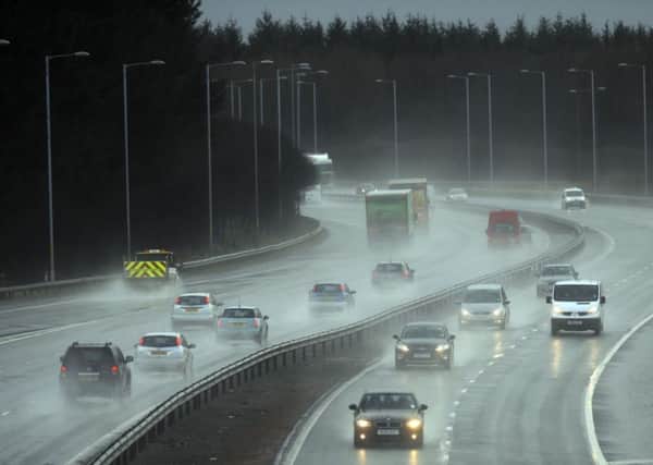 A driver was caught doing 103mph down the M8 motorwayin the rain. Pic: Phil Wilkinson