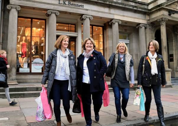 George Street has seen a rise in footfall but business chiefs say more needs to be done. Picture: Gordon Fraser