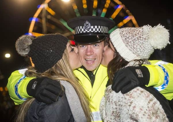 Hogmanay party organisers say a new police pricing policy would leave them with a £250,000 bill. Picture: Ian Georgeson